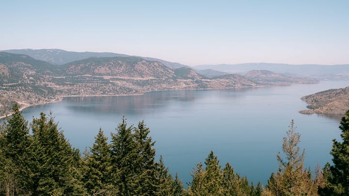 a large blue lake surrounded by mountains